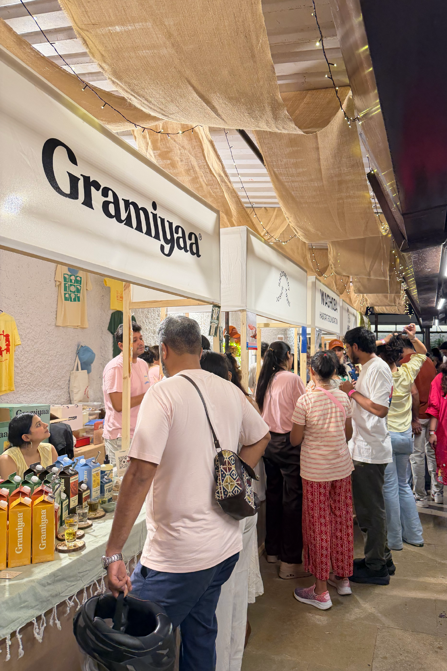 Visitors browsing food stalls at SALT by Goya in Mumbai
