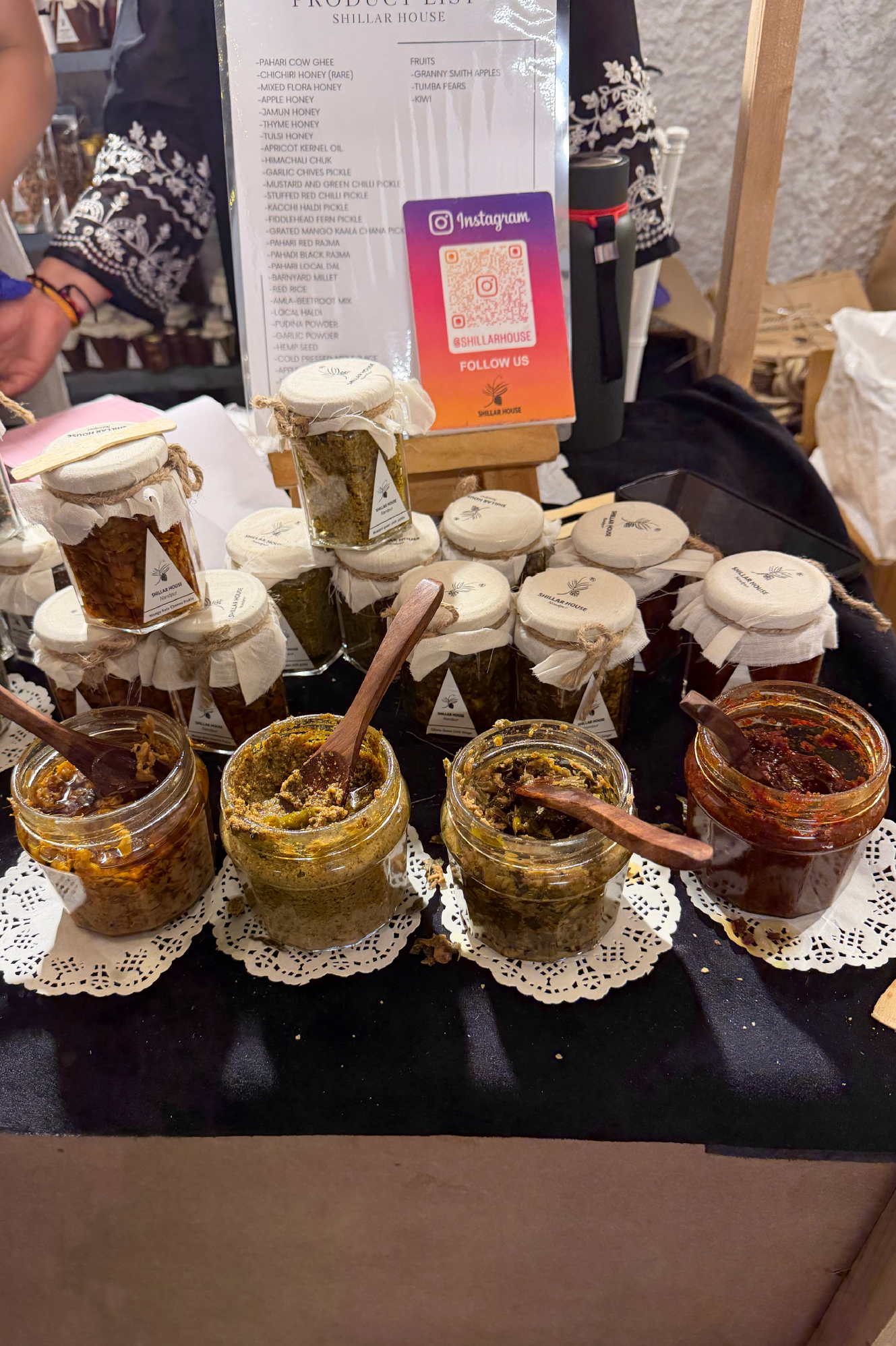 Jars and tasting bowls at a SALT by Goya food stall